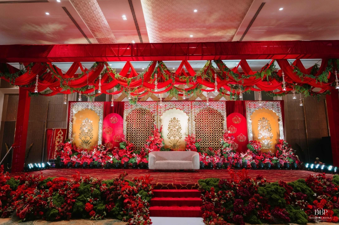 A red ballroom stage in full bloom