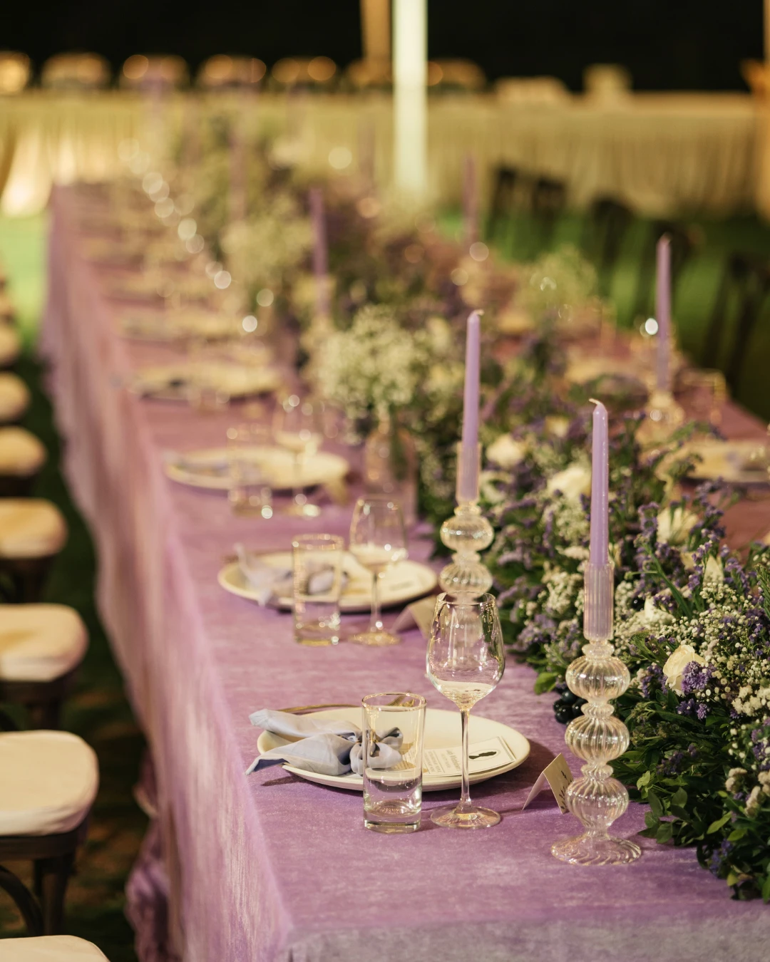 Lavender velvet and candlelight on the table — Gātha