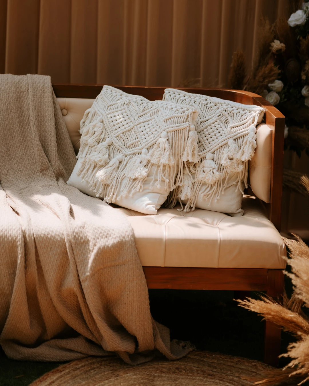 Macramé cushions on a lounge sofa — Gātha