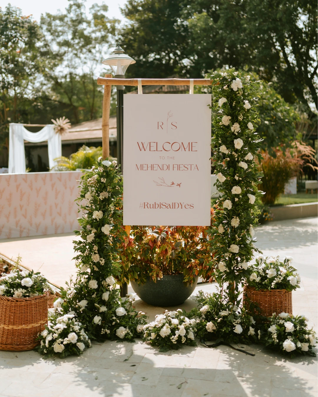 A floral welcome sign for the mehendi