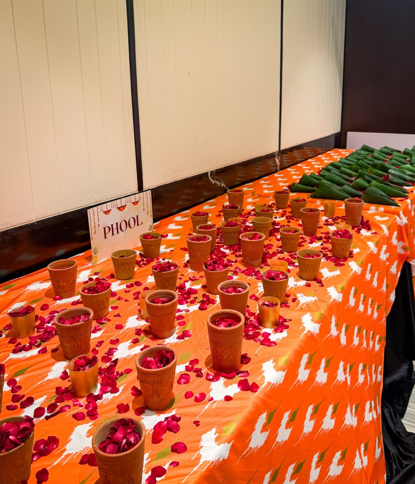 Terracotta cups of rose petals for the ritual